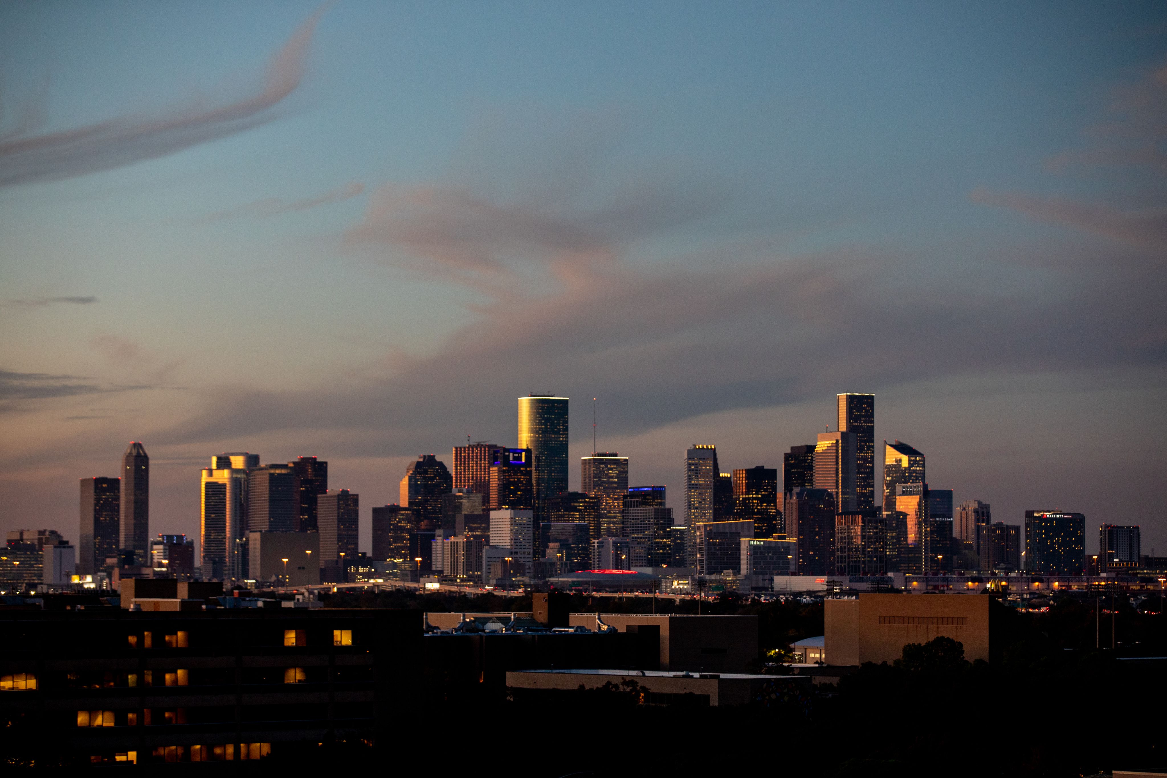 The Houston skyline at dusk, as seen from the University of Houston