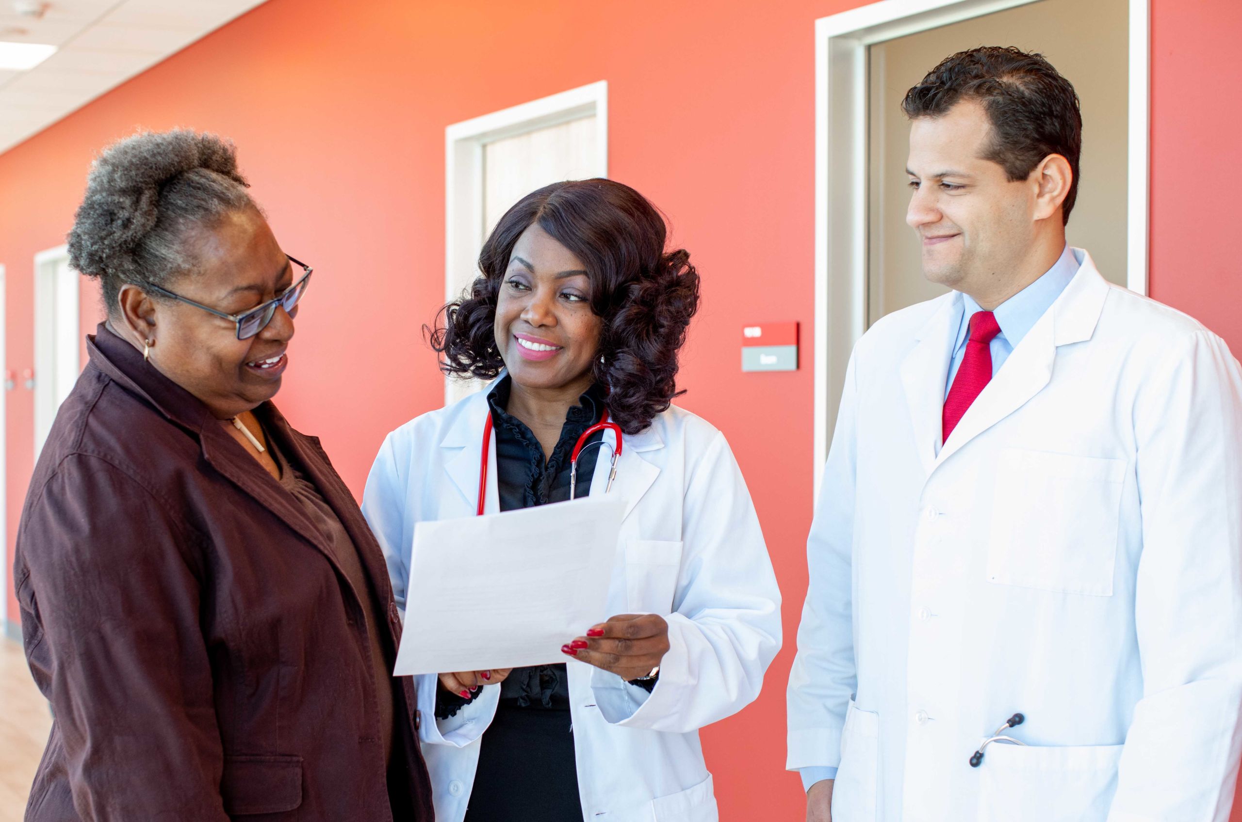A patient visits with doctors.