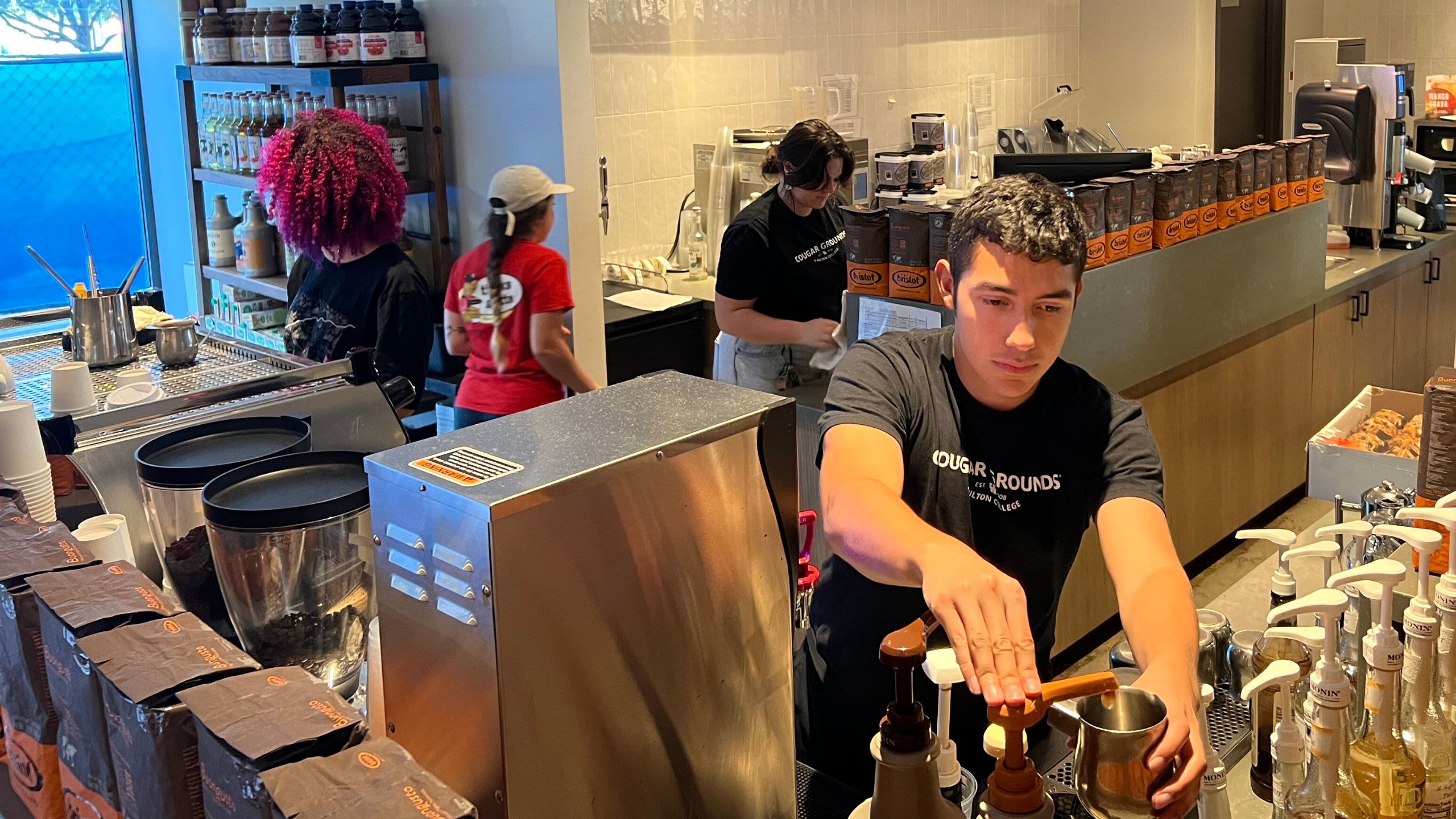 students working at Cougar Grounds