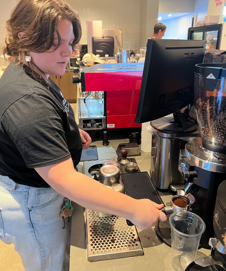 Student making coffee