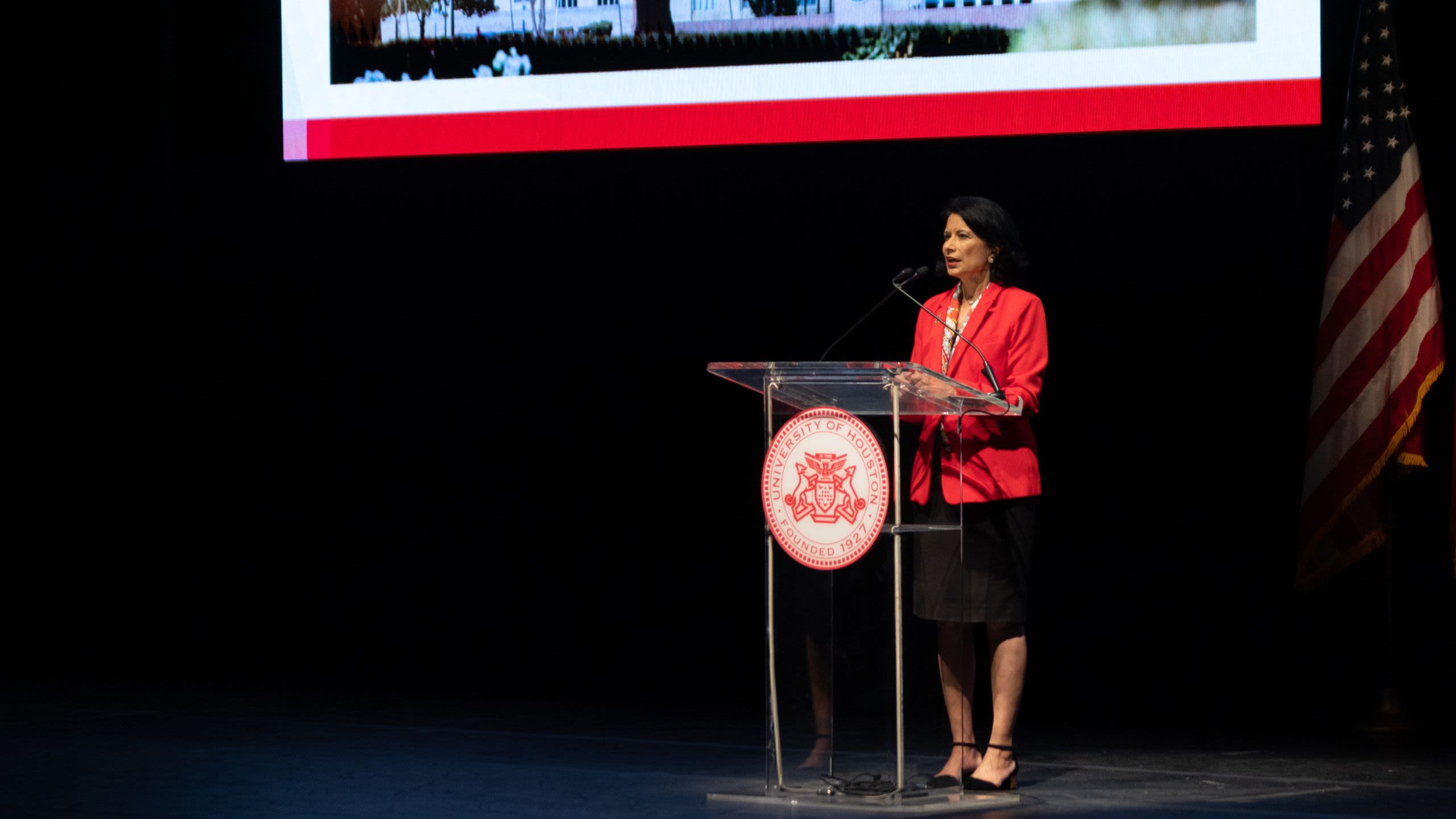 Renu Khator at podium on stage