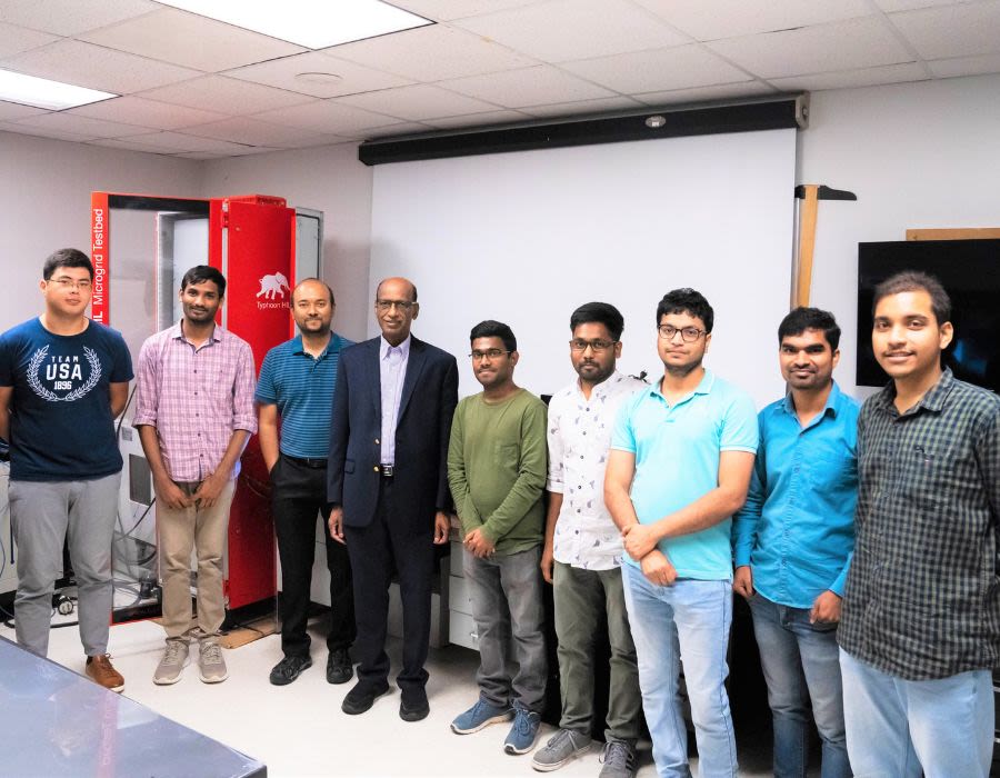 Professor Rajashekara with students at the Cullen College of Engineering.