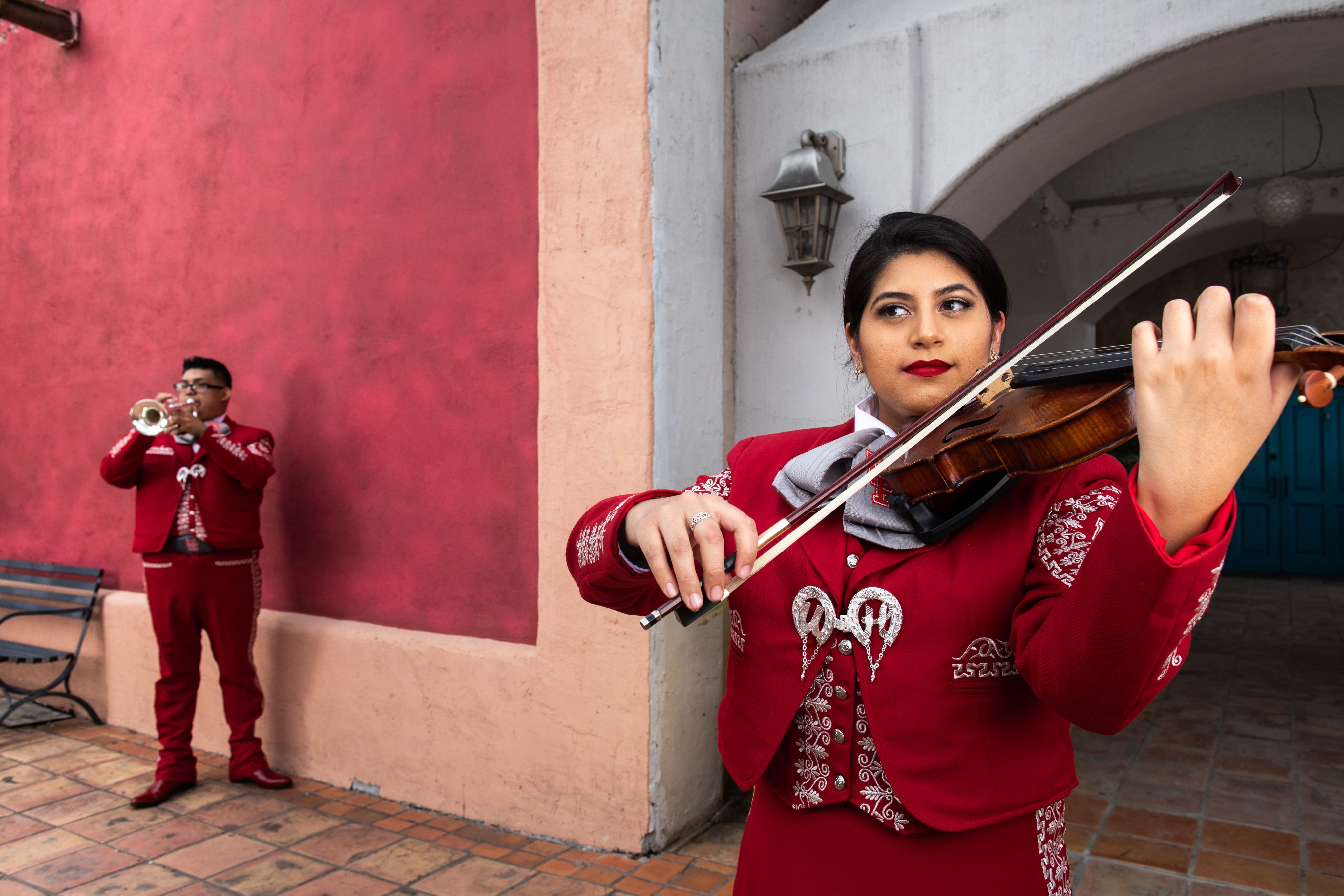 Photo of violinist wearing red