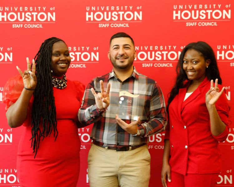 From left: Shanequea White, Staff Council immediate past president; Cristian Garcia, senior recruiter; DaNesha Allen, Staff Council president