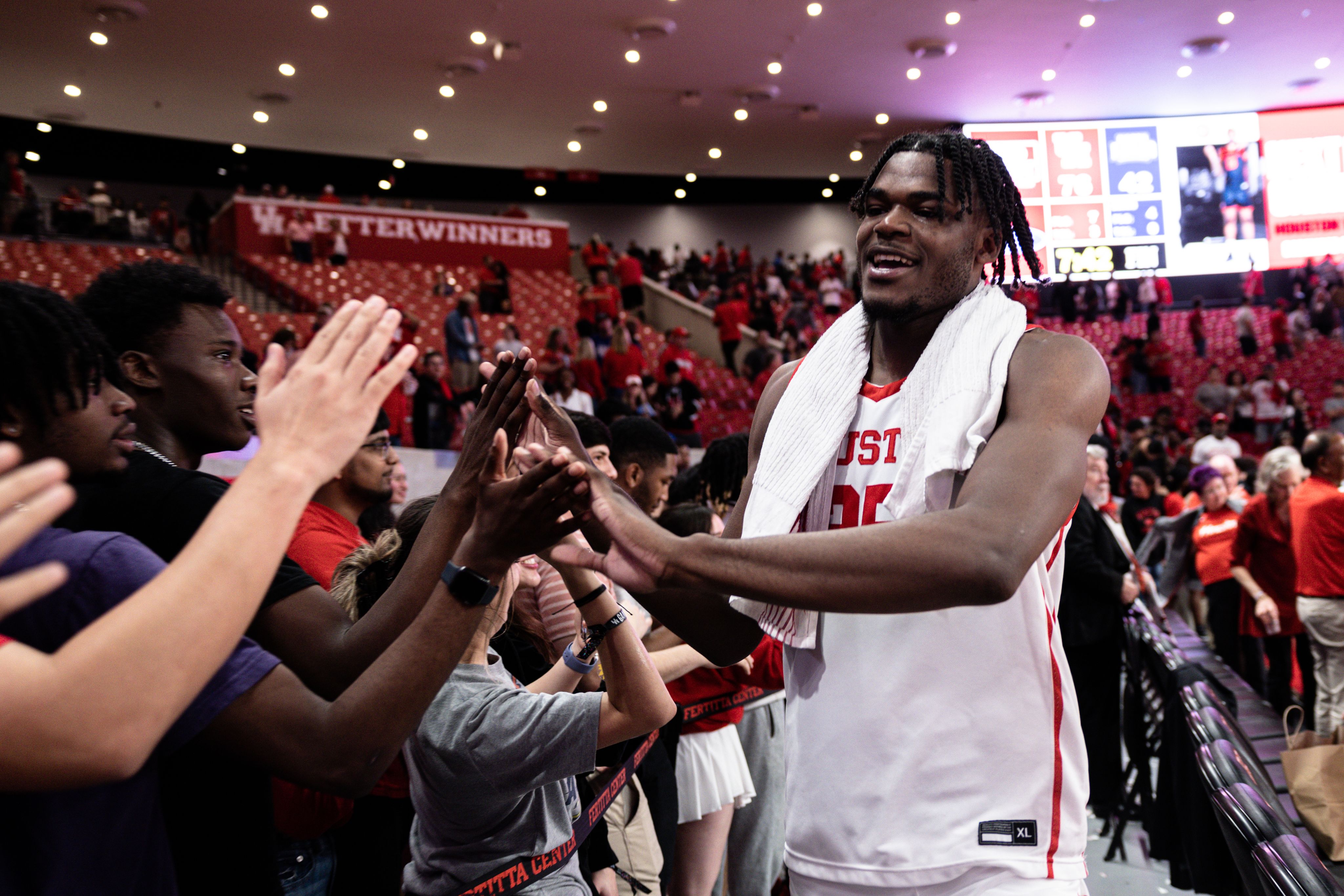 Jarace Walker celebrates with students.