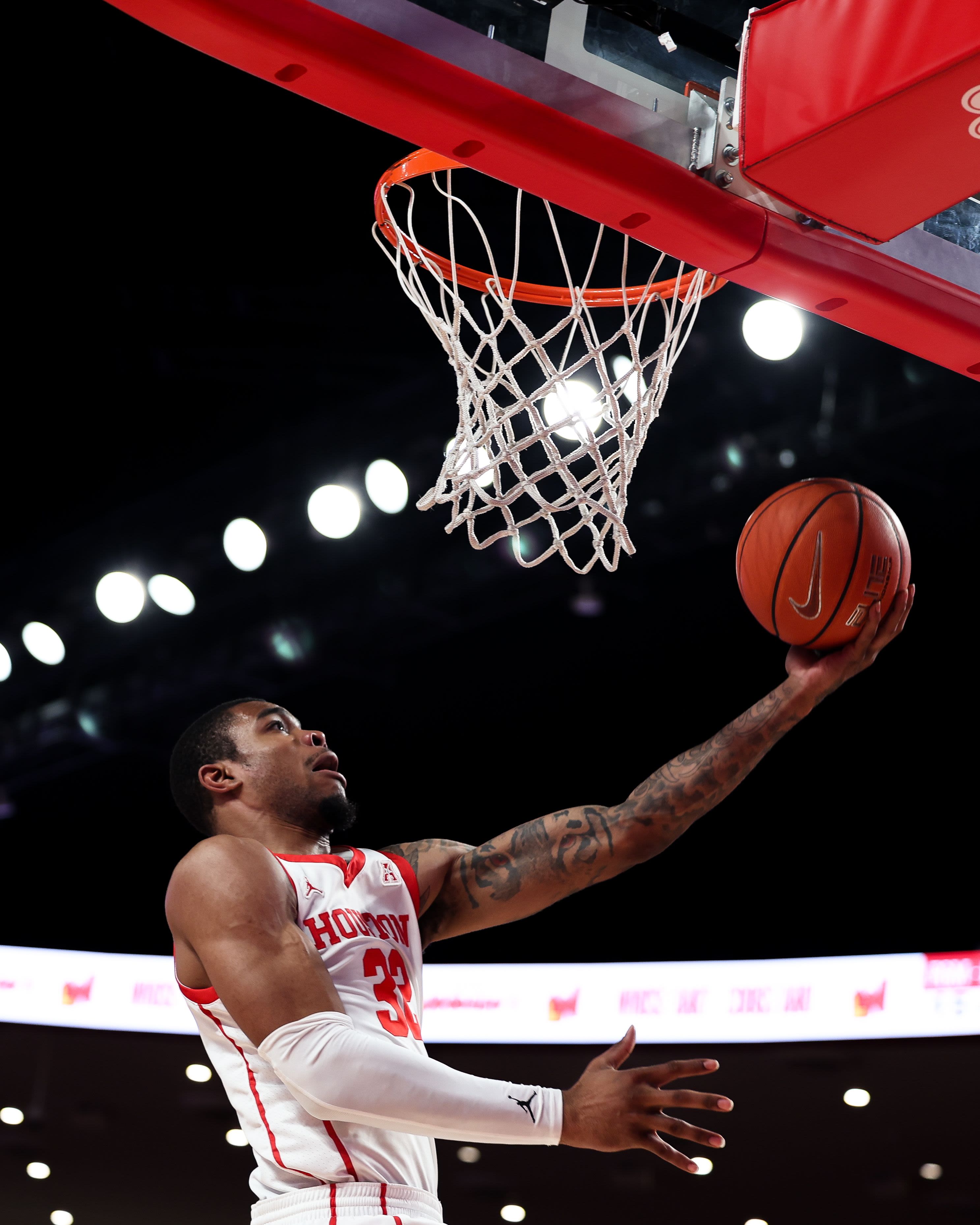 Reggie Chaney jumping for a layup.