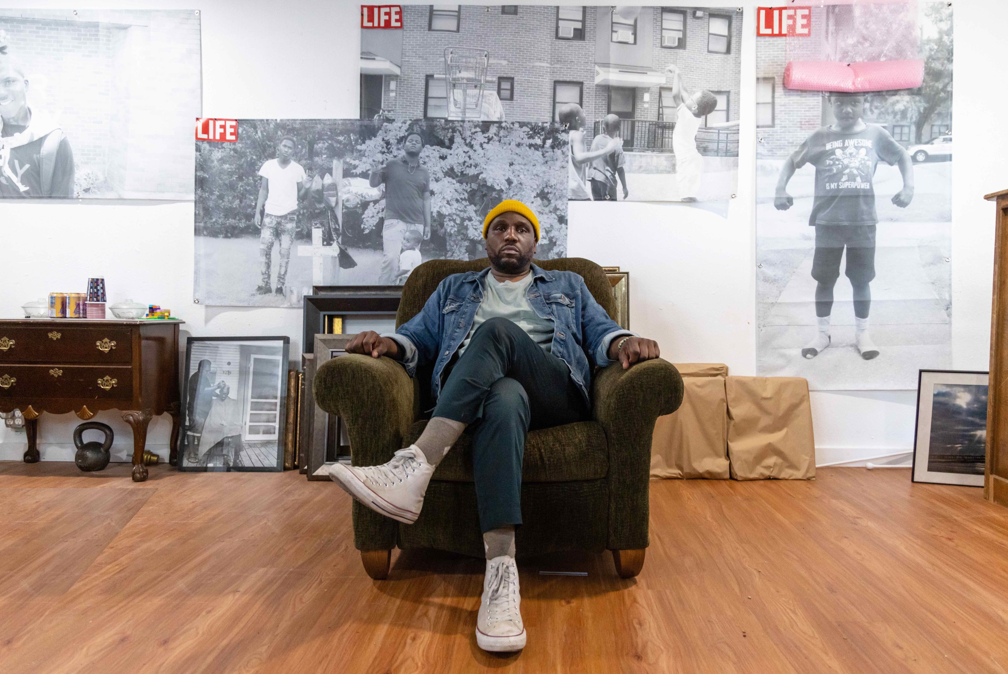 Brian Ellison poses for a portait in his art studio
