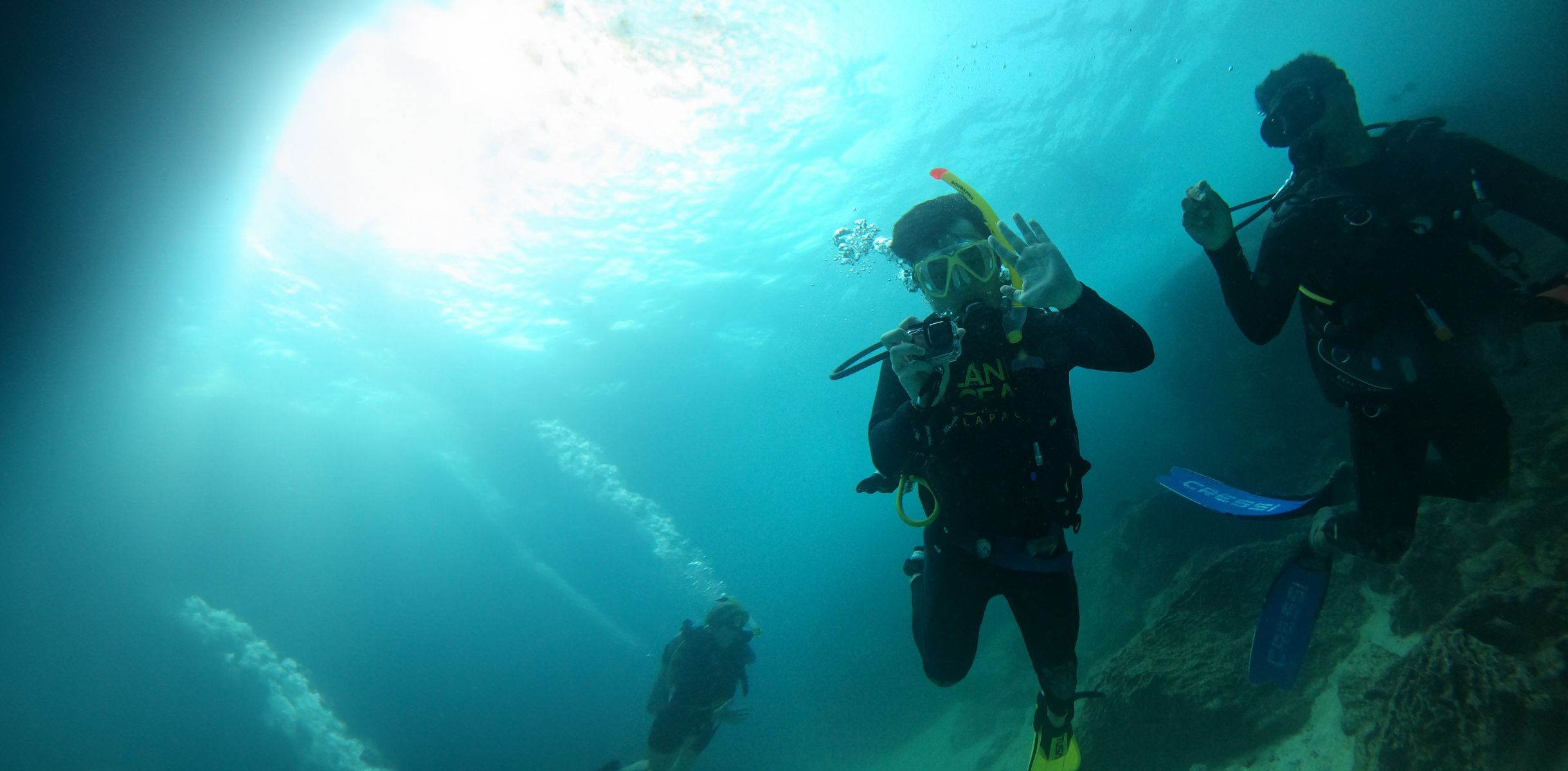 two students scuba diving