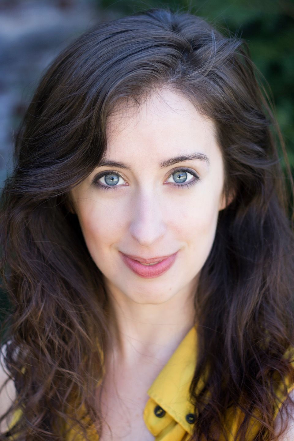 A close up portrait of Amelia Fischer smiling.