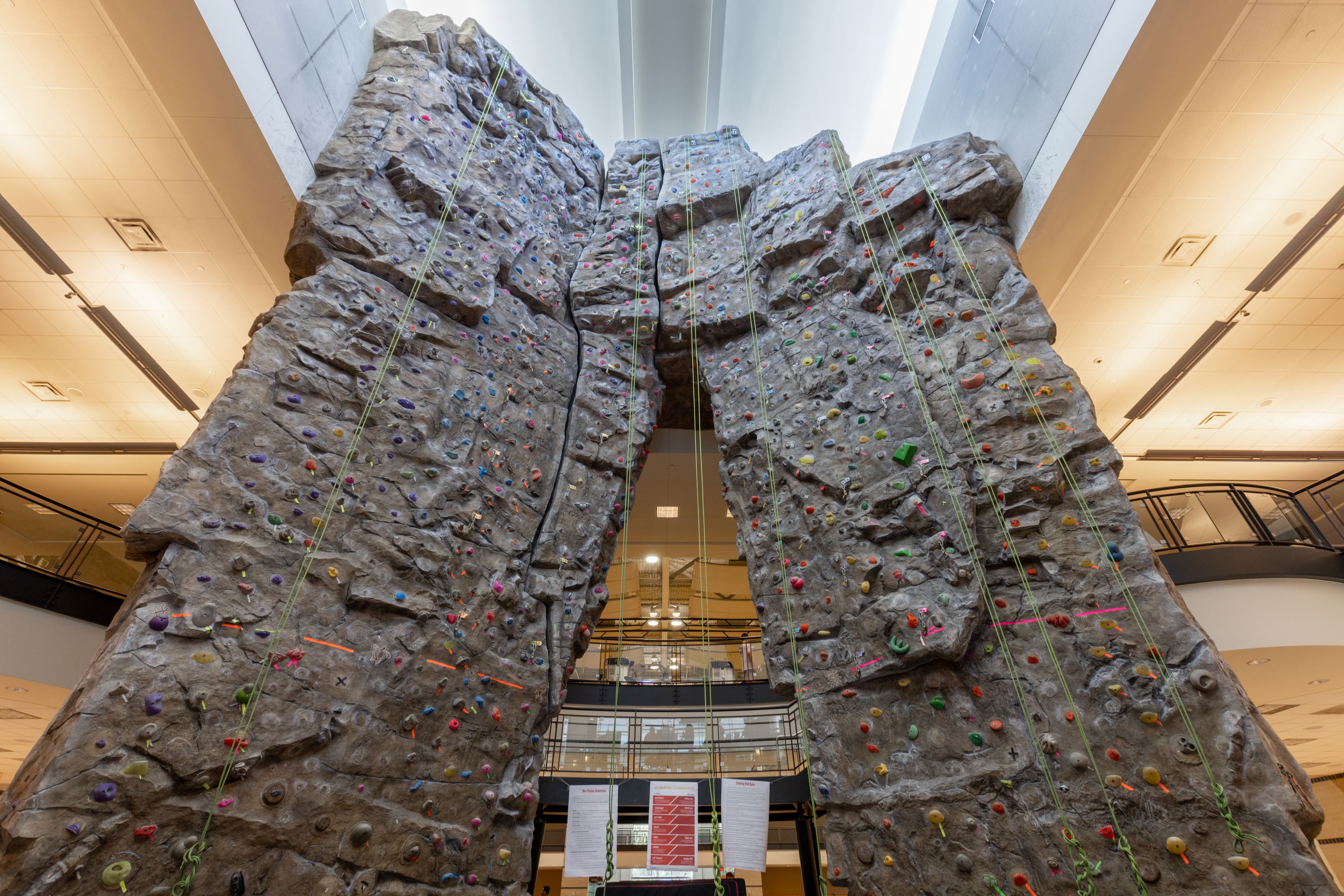 Low-angle view of a large rock wall.