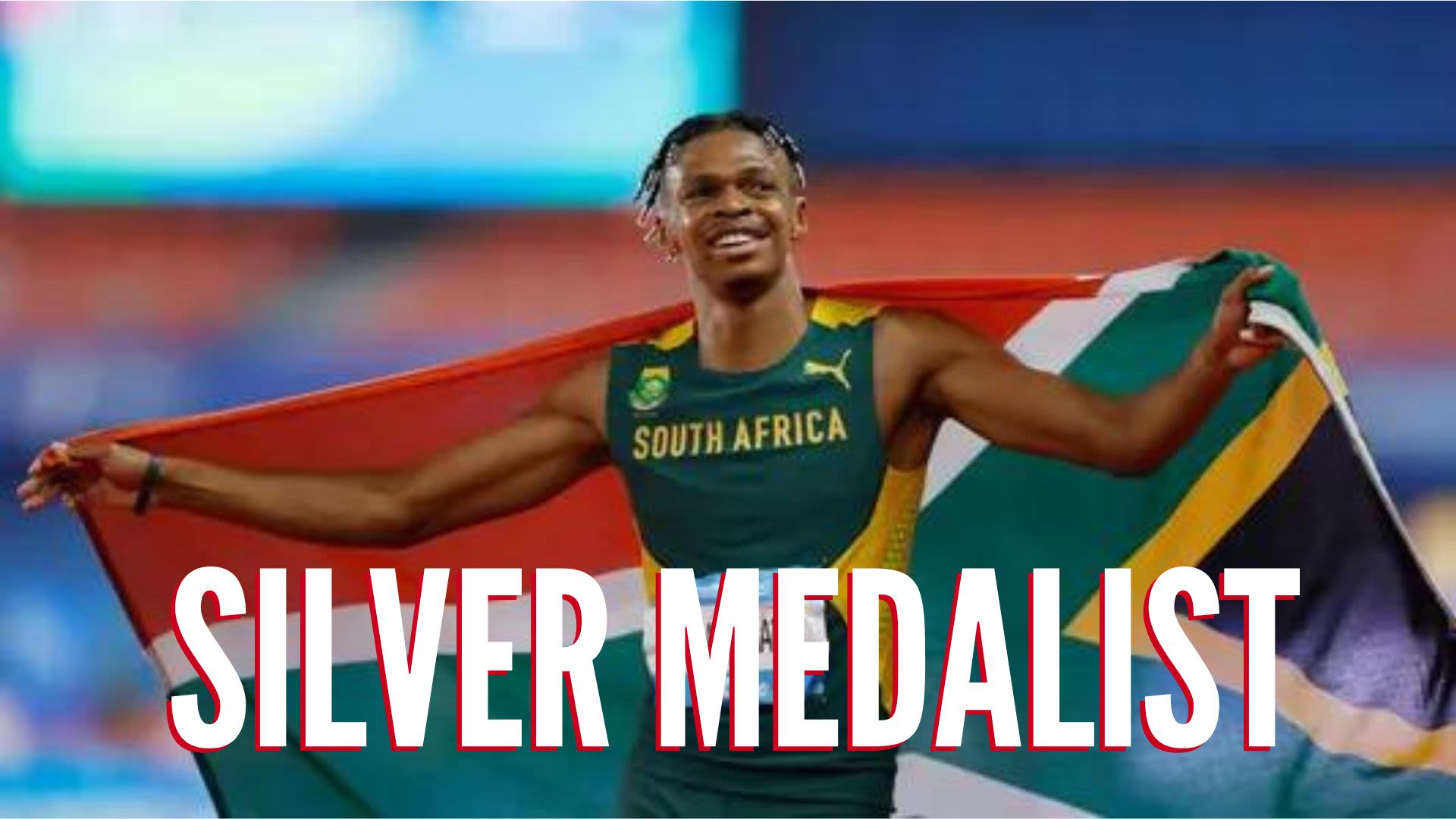 PHOTO of Shaun Maswanganyi and South African Flag draped on shoulders