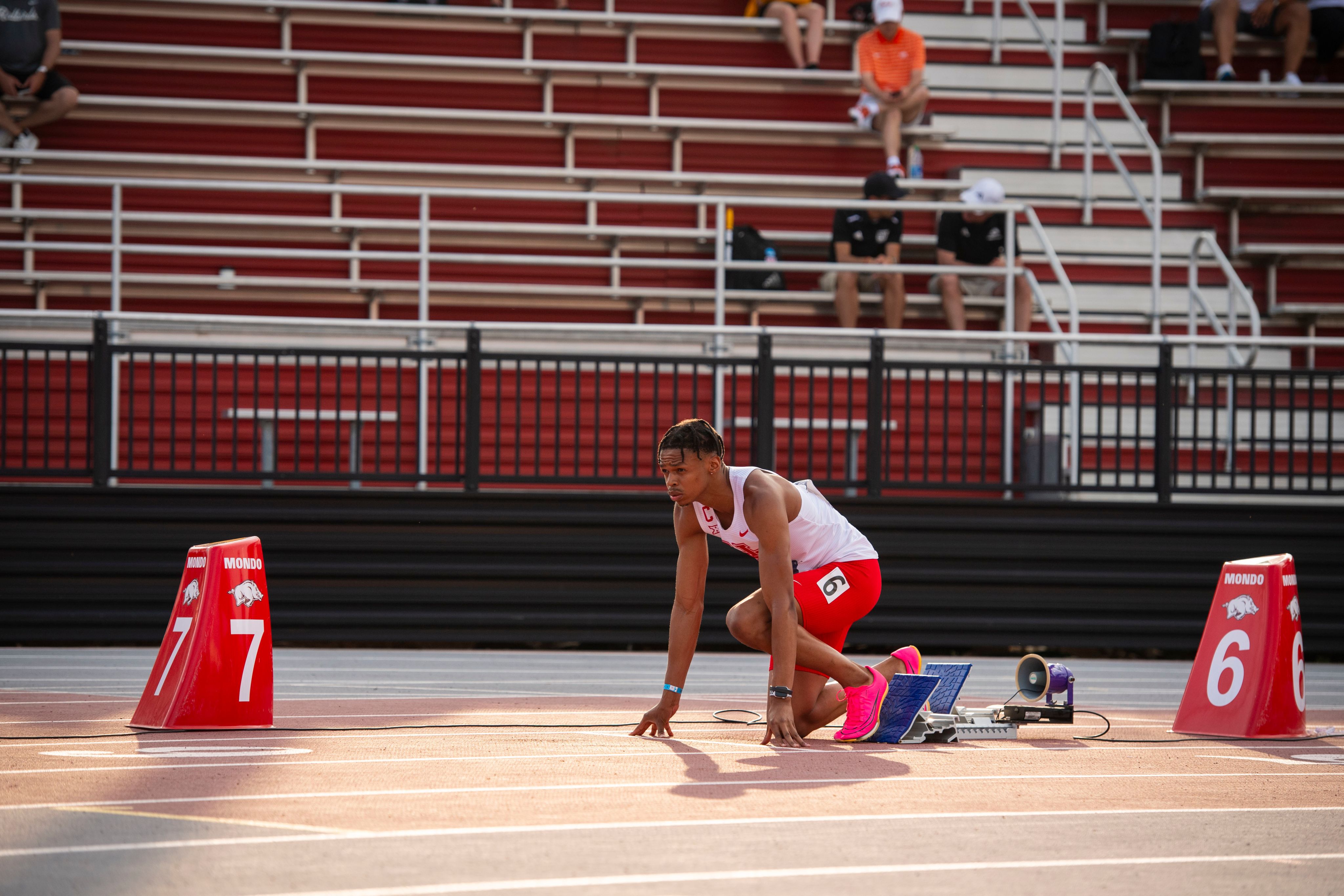 Shaun is in sprinting blocks getting ready to race.