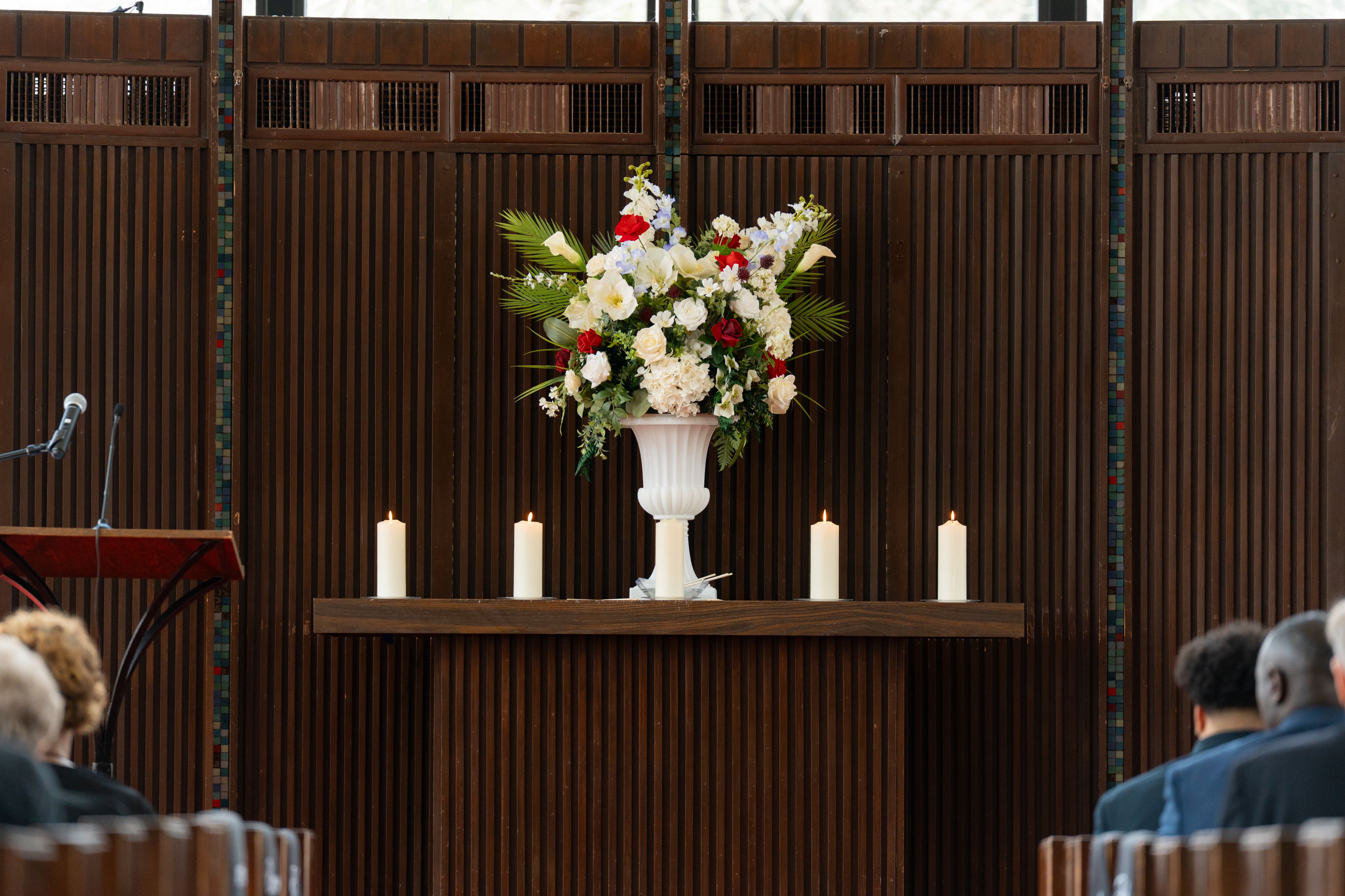 View of the inside of the A.D. Bruce Religion Center during UH Day of Remembrance 2025. It shows four candles lit up.