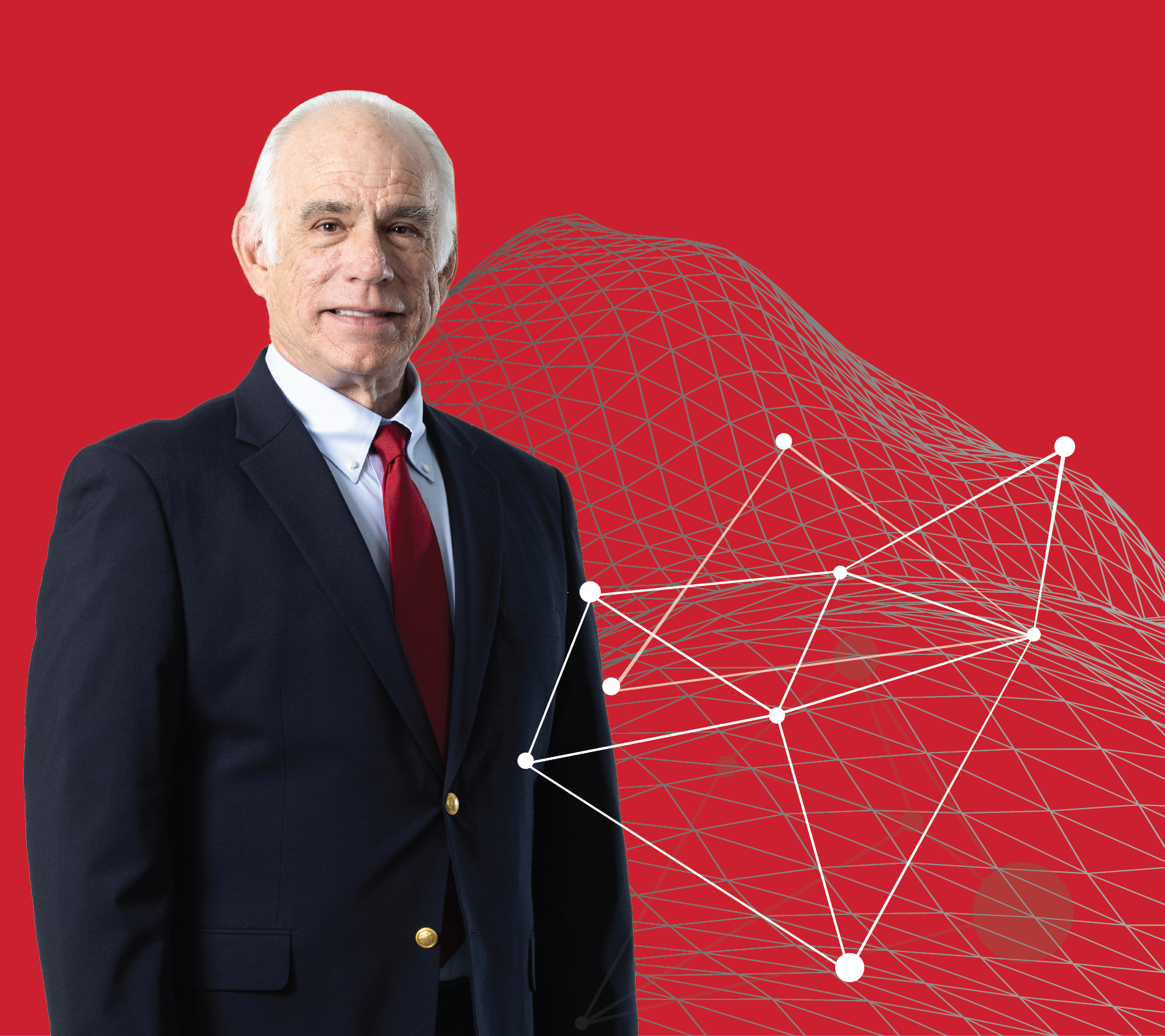 Professional headshot of Ed Hirs on a red background.