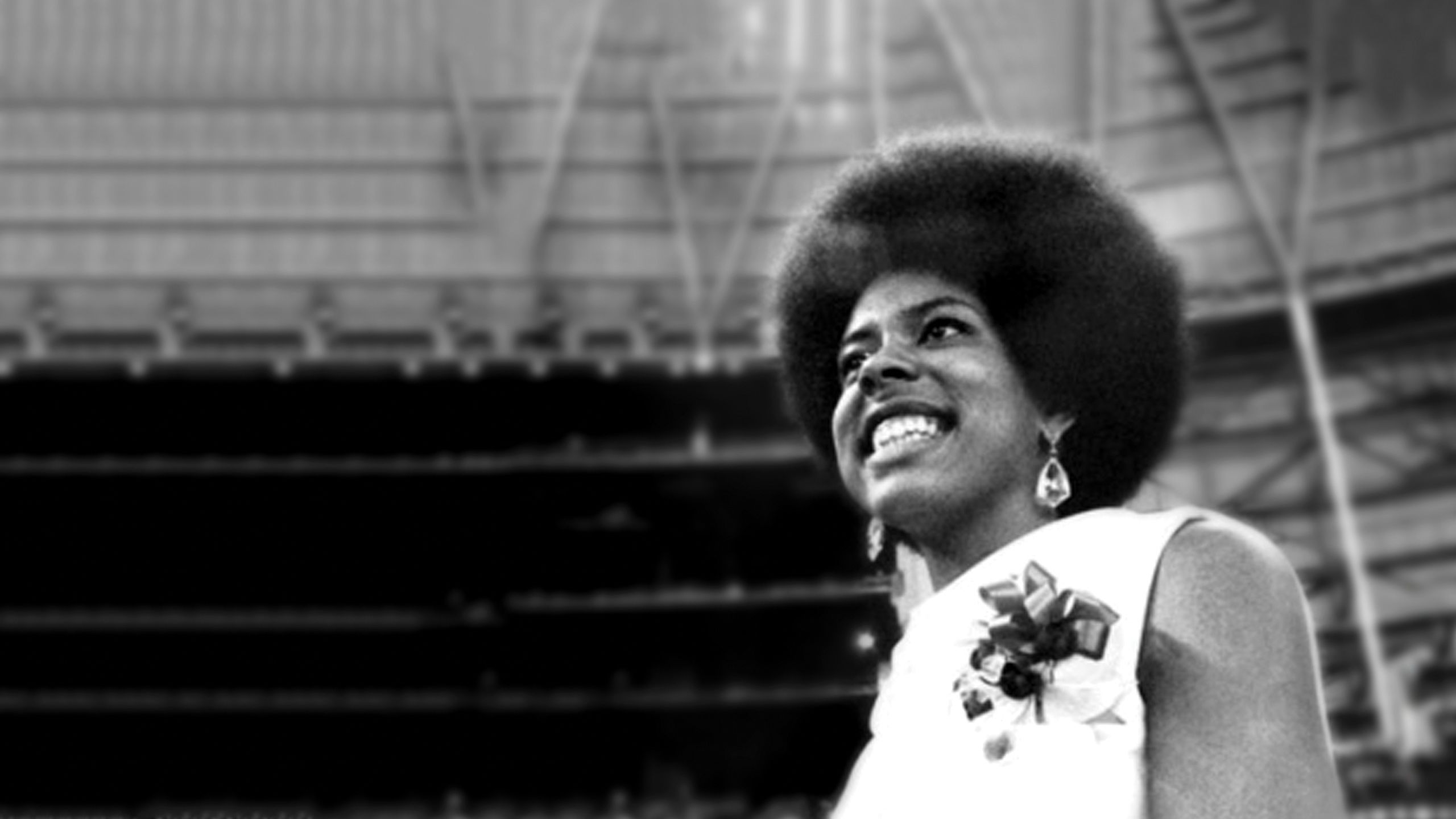 Lynn Eusan smiling inside the Astrodome