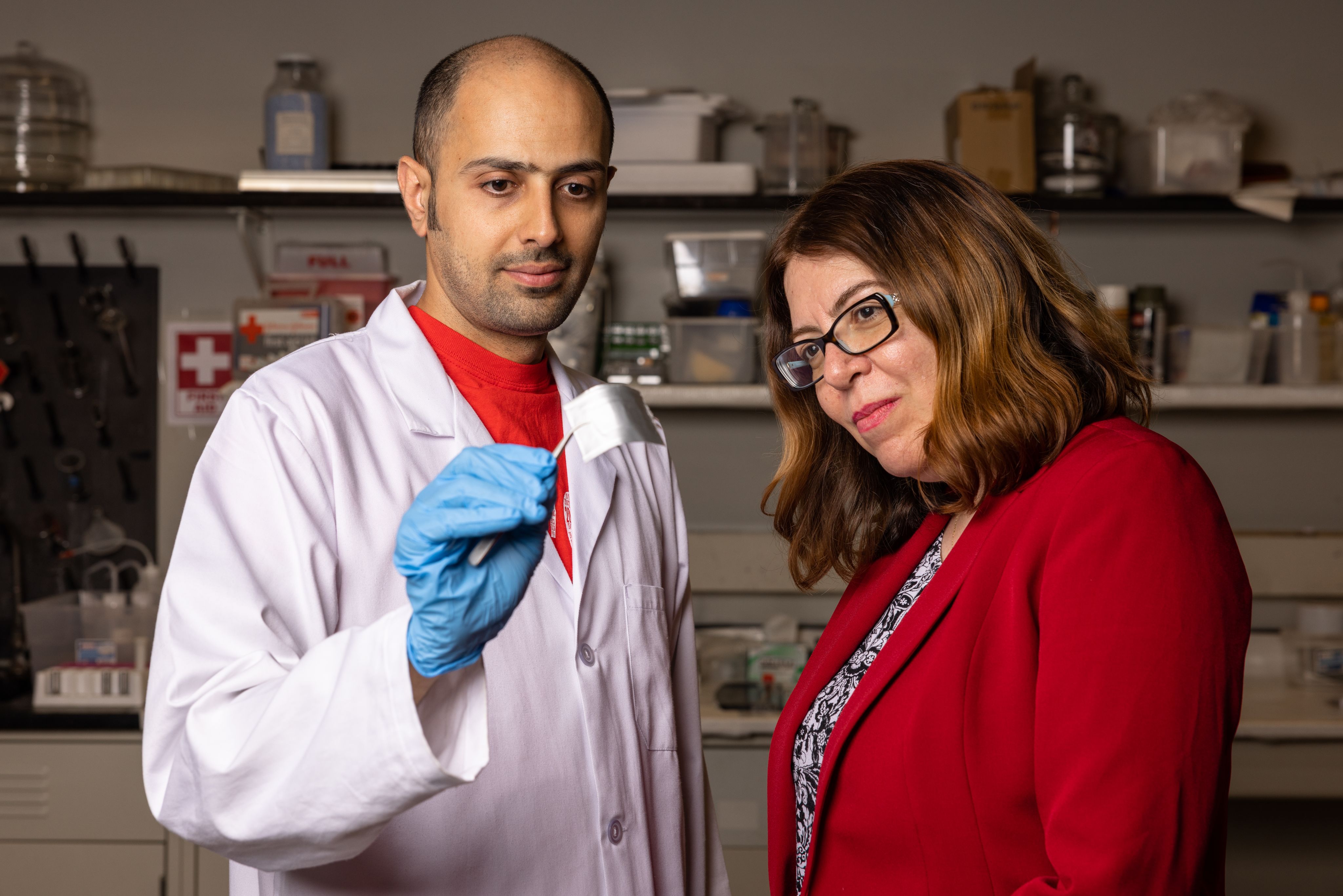 Professor Haleh Ardebili (right) and Navid Khiabani, a UH graduate research assistant, discussing bendable batteries.