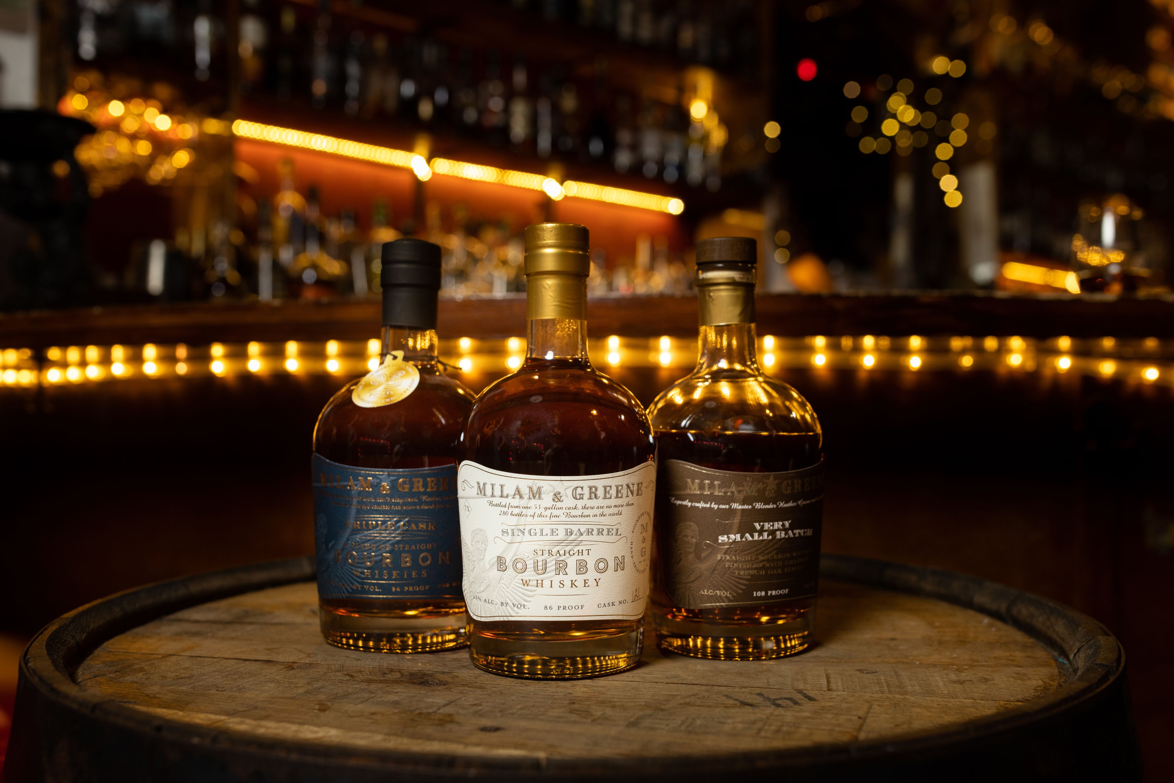 Three bottles of bourbon whisky.