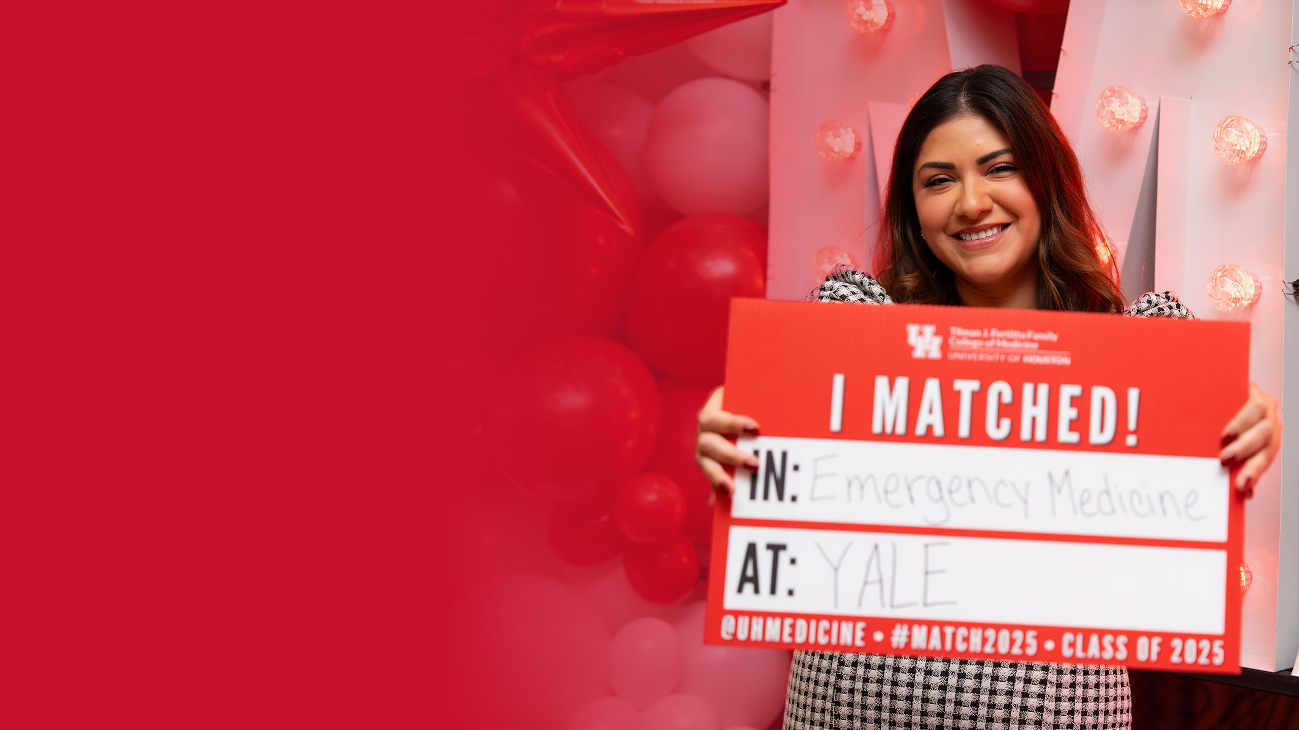 A smiling Iliana Sanchez holds a sign that reads "I matched! In: Emergency Medicine At: Yale"