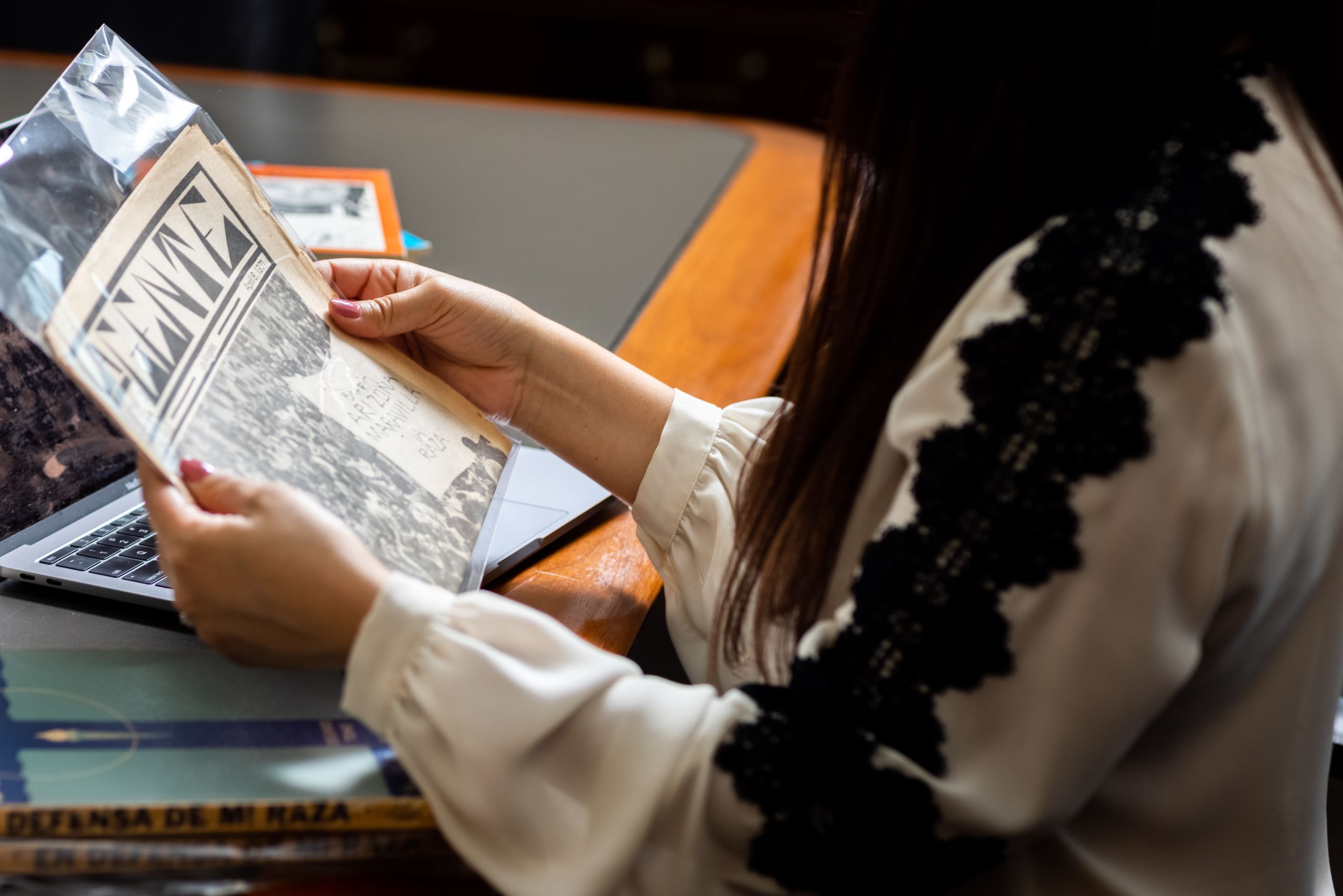 Gauthereau's hands holding old piece of paper media
