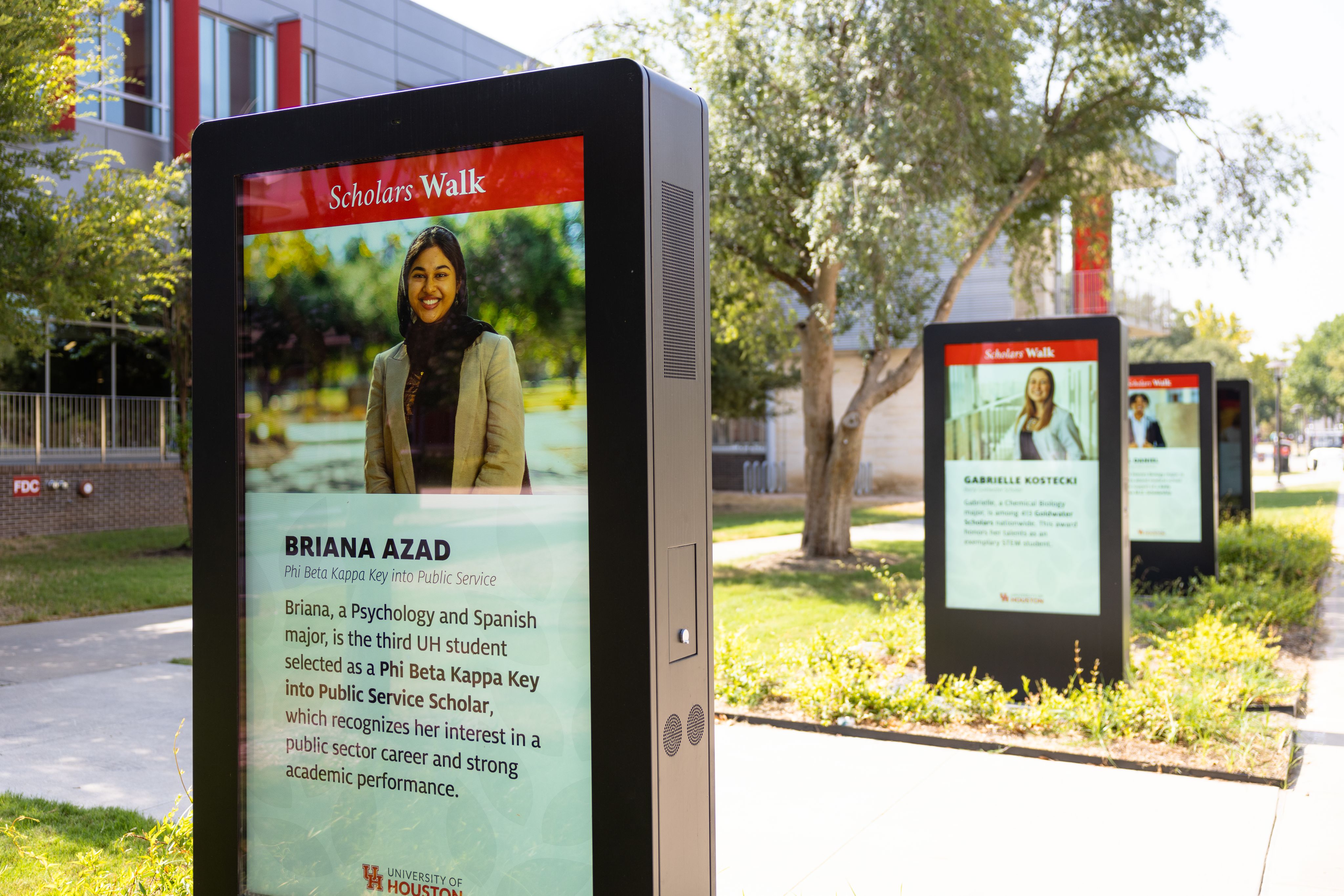 Video screen with photo of femaile student