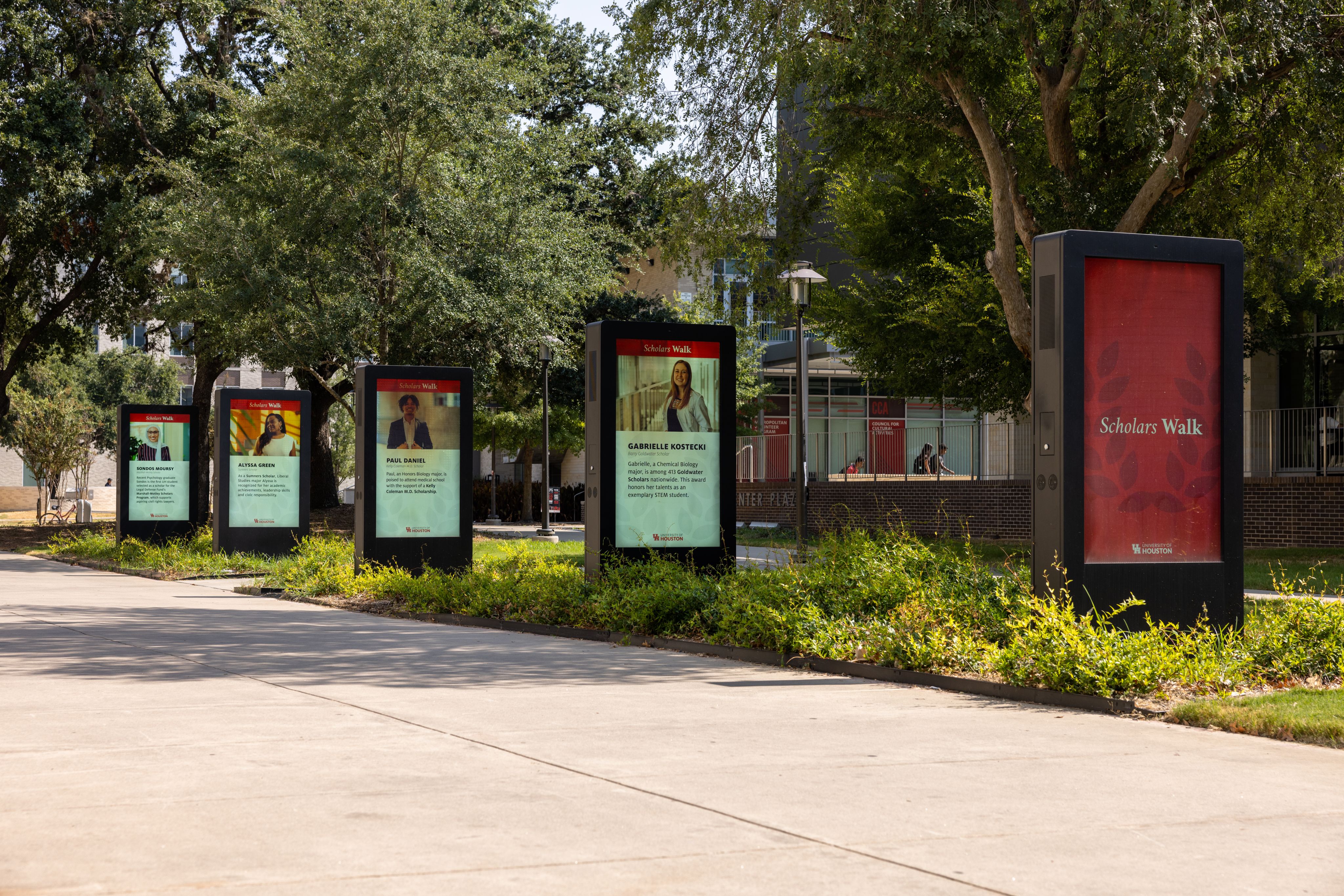 Series of video screens on college campus