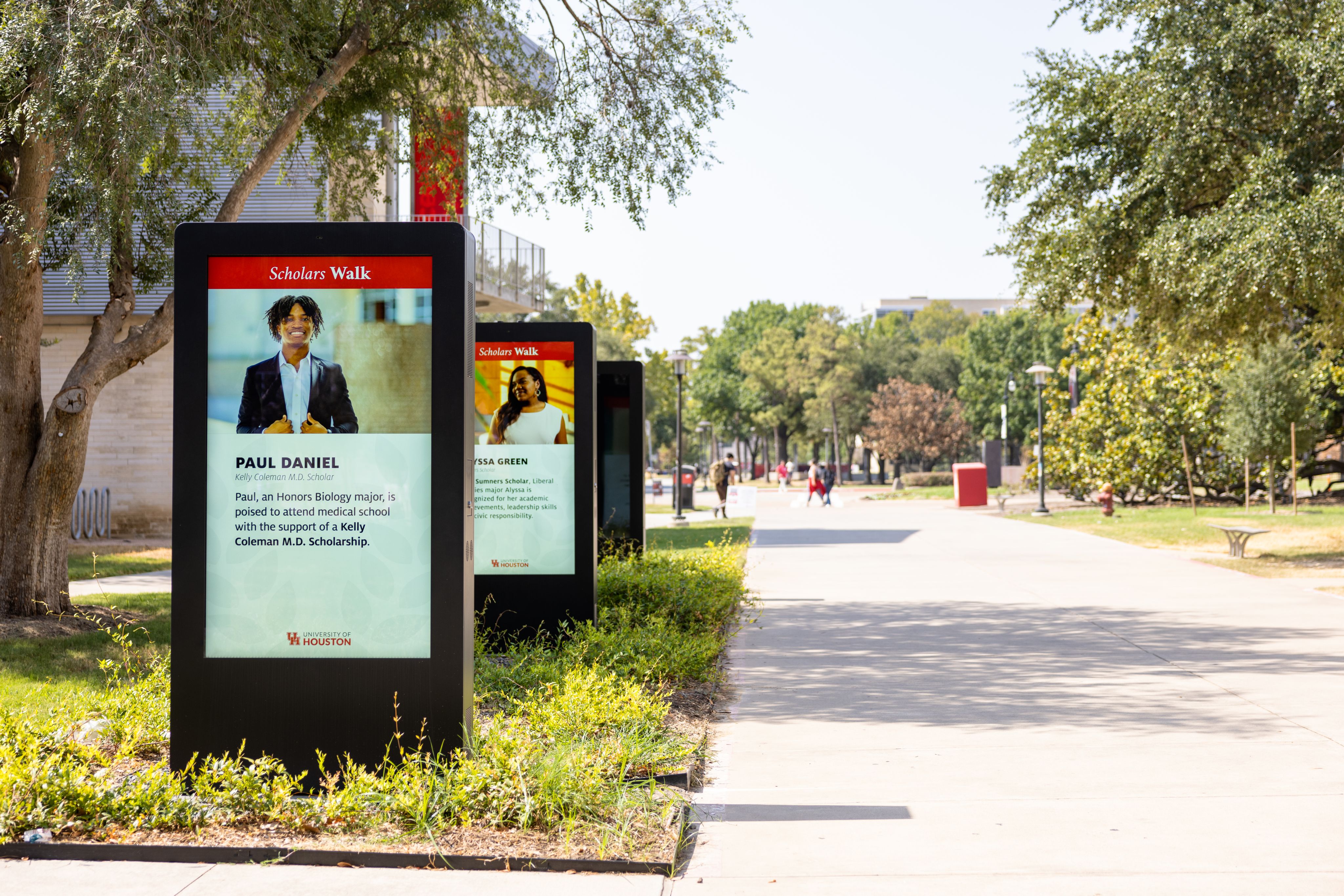 Video screens with images of students