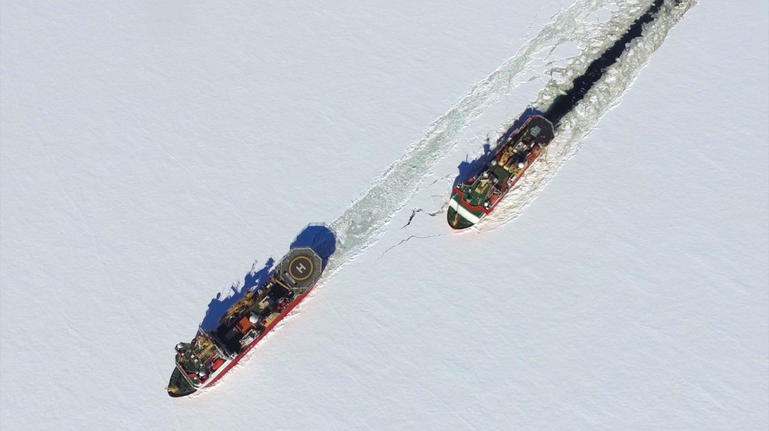 two ships moving through ice